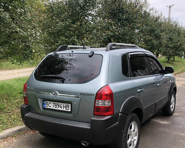 Сірий Хендай Туксон, об'ємом двигуна 1.98 л та пробігом 140 тис. км за 8499 $, фото 2 на Automoto.ua
