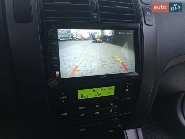 Сірий Хендай Туксон, об'ємом двигуна 1.98 л та пробігом 225 тис. км за 6999 $, фото 14 на Automoto.ua