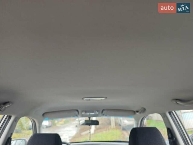 Серый Хендай Туксон, объемом двигателя 1.98 л и пробегом 173 тыс. км за 7450 $, фото 9 на Automoto.ua