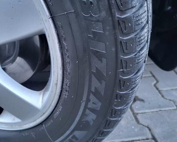 Серый Хендай Туксон, объемом двигателя 2 л и пробегом 240 тыс. км за 8300 $, фото 152 на Automoto.ua