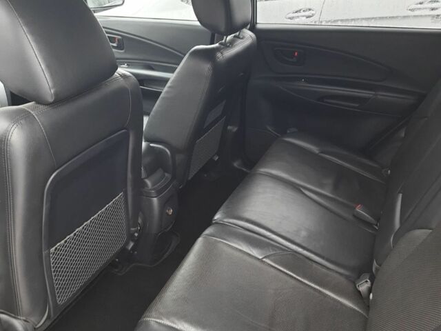 Сірий Хендай Туксон, об'ємом двигуна 2 л та пробігом 177 тис. км за 7400 $, фото 4 на Automoto.ua