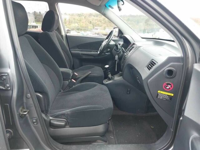 Серый Хендай Туксон, объемом двигателя 2 л и пробегом 245 тыс. км за 4112 $, фото 6 на Automoto.ua