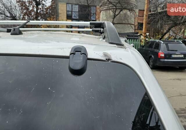 Серый Хендай Туксон, объемом двигателя 2 л и пробегом 330 тыс. км за 4000 $, фото 16 на Automoto.ua