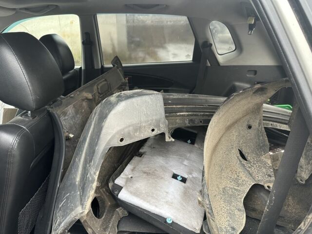 Серый Хендай Туксон, объемом двигателя 2 л и пробегом 350 тыс. км за 3850 $, фото 10 на Automoto.ua