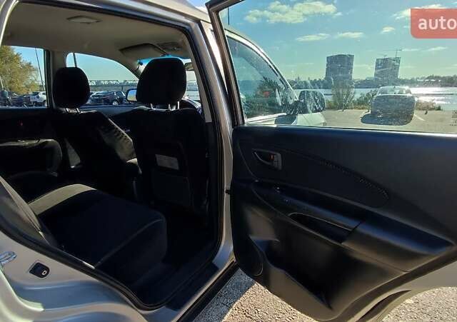 Сірий Хендай Туксон, об'ємом двигуна 1.98 л та пробігом 296 тис. км за 7500 $, фото 21 на Automoto.ua