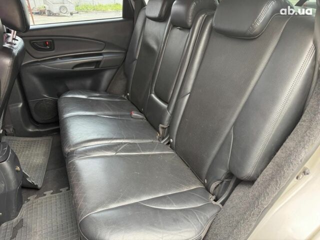 Серый Хендай Туксон, объемом двигателя 2 л и пробегом 214 тыс. км за 7990 $, фото 10 на Automoto.ua