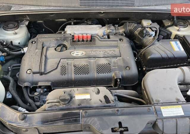 Серый Хендай Туксон, объемом двигателя 1.98 л и пробегом 193 тыс. км за 8400 $, фото 26 на Automoto.ua