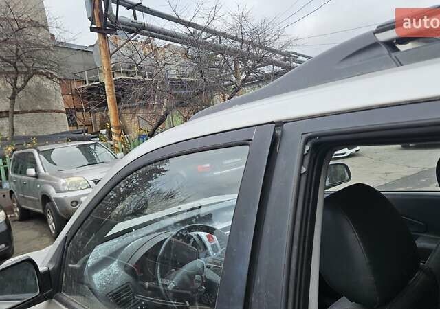 Серый Хендай Туксон, объемом двигателя 2 л и пробегом 330 тыс. км за 4000 $, фото 22 на Automoto.ua