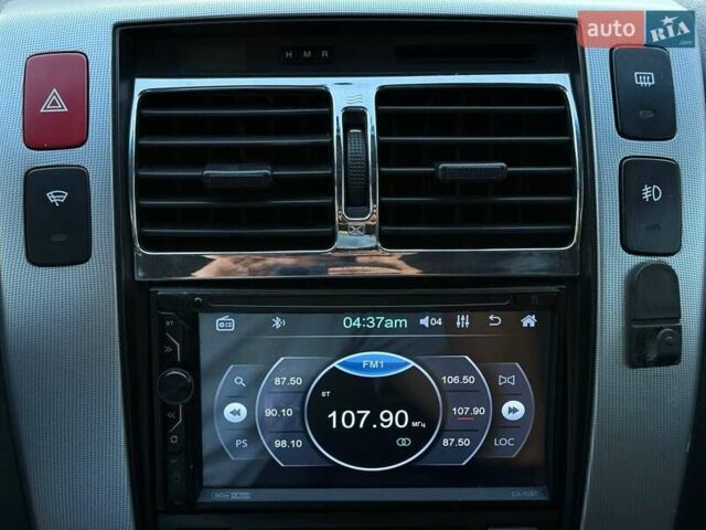 Серый Хендай Туксон, объемом двигателя 1.98 л и пробегом 282 тыс. км за 8350 $, фото 24 на Automoto.ua