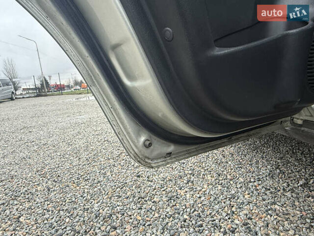 Сірий Хендай Туксон, об'ємом двигуна 1.98 л та пробігом 169 тис. км за 7890 $, фото 24 на Automoto.ua