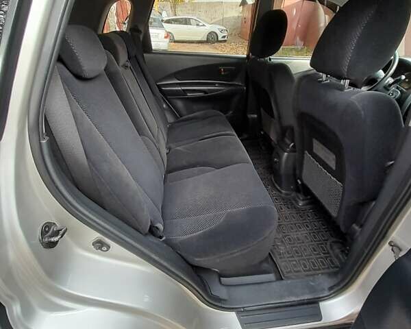 Сірий Хендай Туксон, об'ємом двигуна 2 л та пробігом 182 тис. км за 8800 $, фото 16 на Automoto.ua