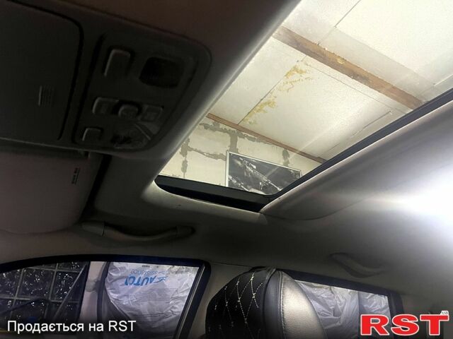 Сірий Хендай Туксон, об'ємом двигуна 2 л та пробігом 152 тис. км за 10000 $, фото 4 на Automoto.ua