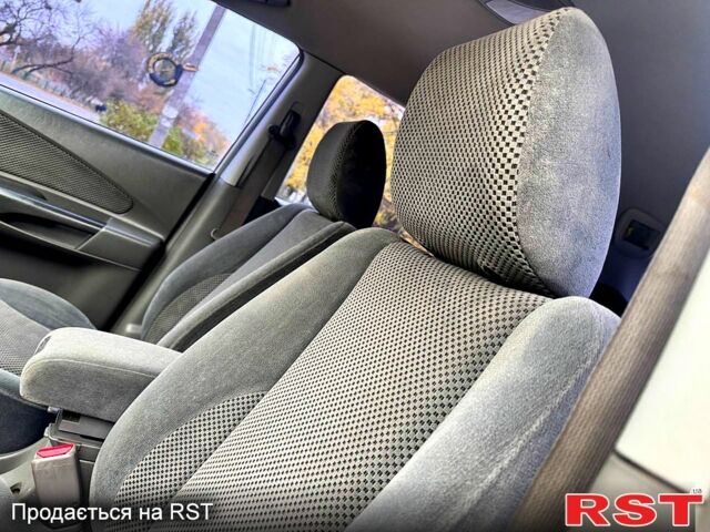 Сірий Хендай Туксон, об'ємом двигуна 2 л та пробігом 316 тис. км за 6780 $, фото 6 на Automoto.ua