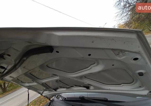 Сірий Хендай Туксон, об'ємом двигуна 2 л та пробігом 203 тис. км за 7700 $, фото 19 на Automoto.ua