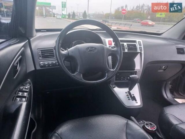 Сірий Хендай Туксон, об'ємом двигуна 2 л та пробігом 190 тис. км за 8600 $, фото 56 на Automoto.ua