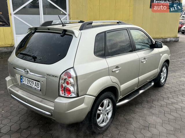 Сірий Хендай Туксон, об'ємом двигуна 2 л та пробігом 257 тис. км за 6550 $, фото 8 на Automoto.ua