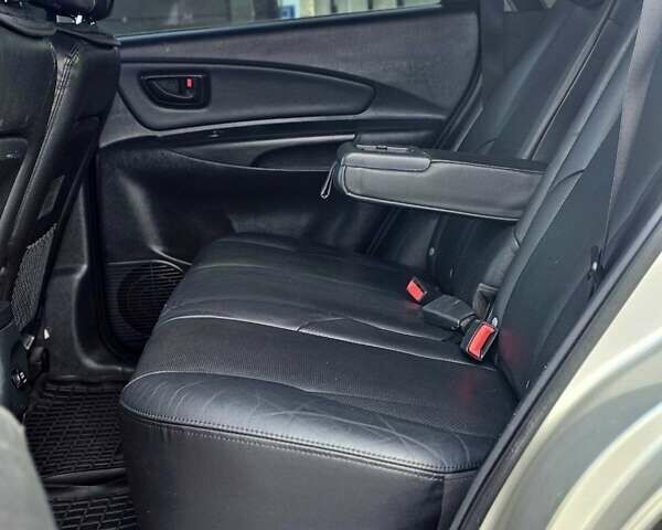 Сірий Хендай Туксон, об'ємом двигуна 2 л та пробігом 198 тис. км за 8250 $, фото 8 на Automoto.ua