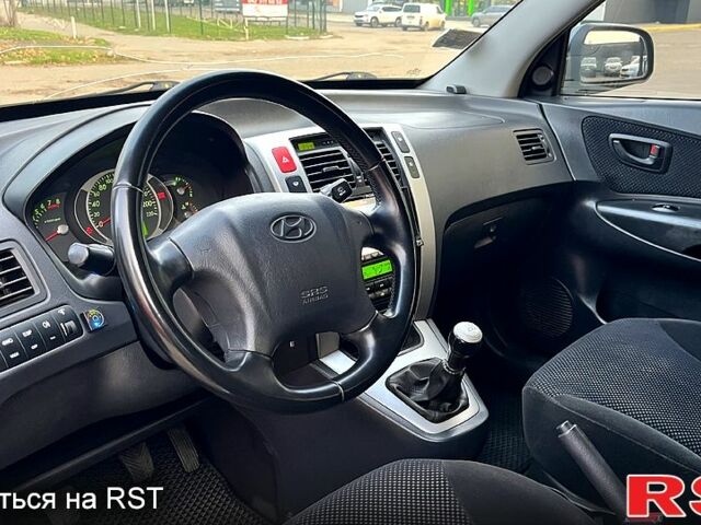 Сірий Хендай Туксон, об'ємом двигуна 2 л та пробігом 281 тис. км за 7200 $, фото 6 на Automoto.ua