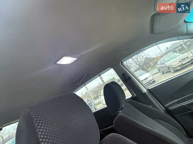 Сірий Хендай Туксон, об'ємом двигуна 1.98 л та пробігом 169 тис. км за 7890 $, фото 11 на Automoto.ua
