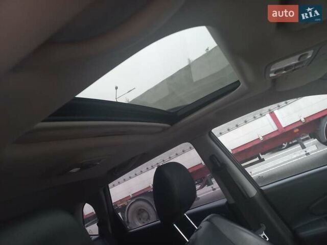 Сірий Хендай Туксон, об'ємом двигуна 2 л та пробігом 190 тис. км за 8600 $, фото 45 на Automoto.ua