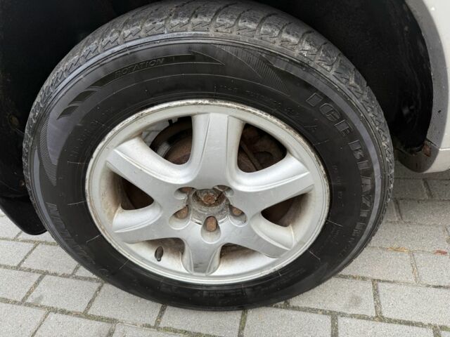 Серый Хендай Туксон, объемом двигателя 2 л и пробегом 175 тыс. км за 3400 $, фото 13 на Automoto.ua