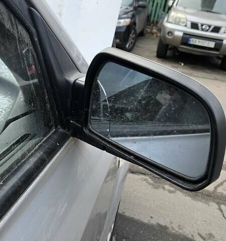 Серый Хендай Туксон, объемом двигателя 2 л и пробегом 330 тыс. км за 4000 $, фото 5 на Automoto.ua