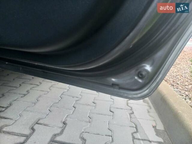 Сірий Хендай Туксон, об'ємом двигуна 2 л та пробігом 190 тис. км за 8600 $, фото 51 на Automoto.ua