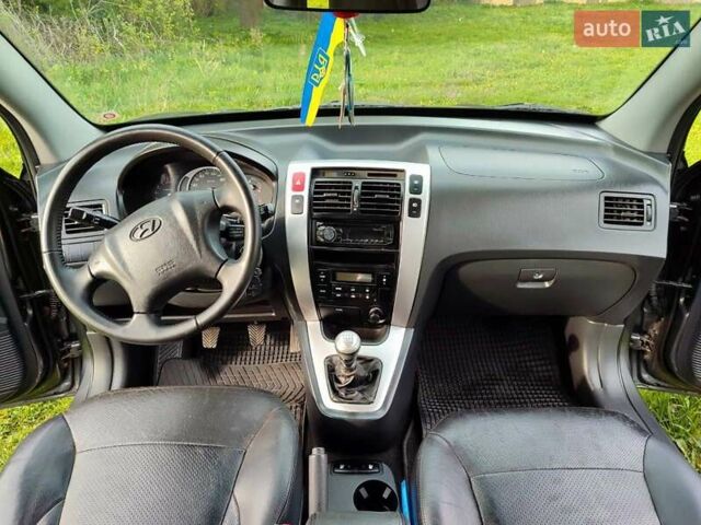 Серый Хендай Туксон, объемом двигателя 1.99 л и пробегом 184 тыс. км за 8300 $, фото 22 на Automoto.ua