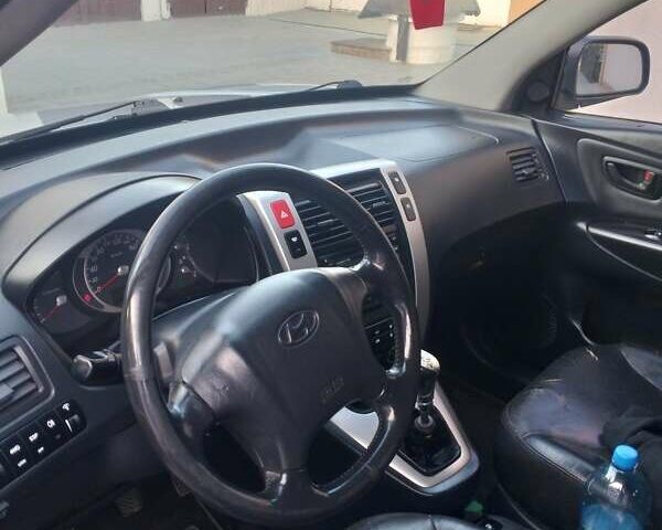 Сірий Хендай Туксон, об'ємом двигуна 1.98 л та пробігом 305 тис. км за 8700 $, фото 2 на Automoto.ua