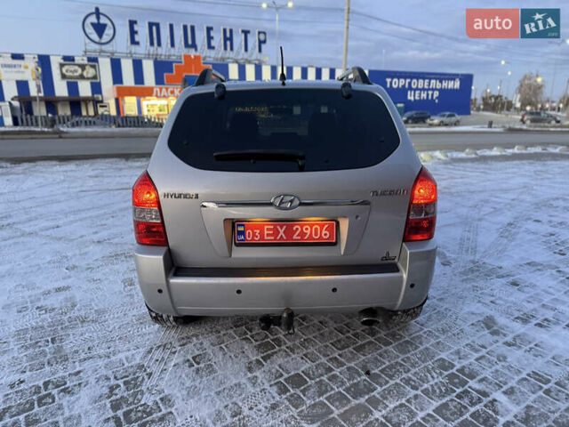Серый Хендай Туксон, объемом двигателя 1.98 л и пробегом 255 тыс. км за 7999 $, фото 6 на Automoto.ua