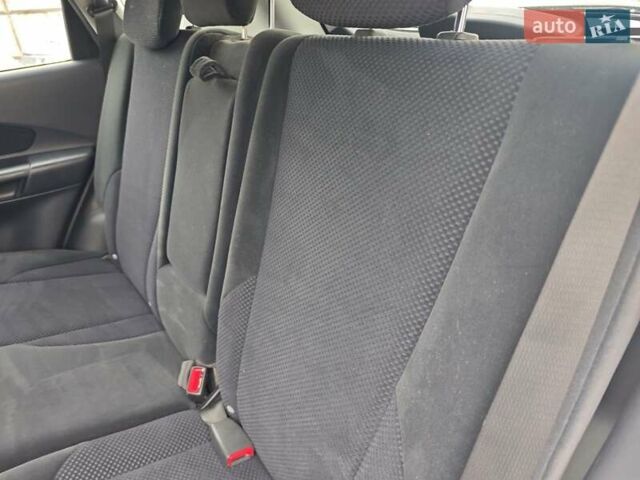 Серый Хендай Туксон, объемом двигателя 1.98 л и пробегом 173 тыс. км за 7450 $, фото 33 на Automoto.ua