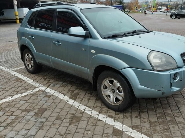 Серый Хендай Туксон, объемом двигателя 2 л и пробегом 2 тыс. км за 6800 $, фото 2 на Automoto.ua
