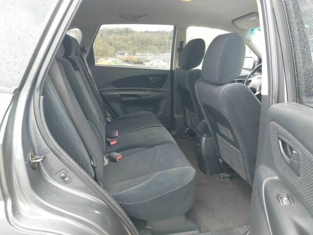 Серый Хендай Туксон, объемом двигателя 2 л и пробегом 245 тыс. км за 4112 $, фото 7 на Automoto.ua