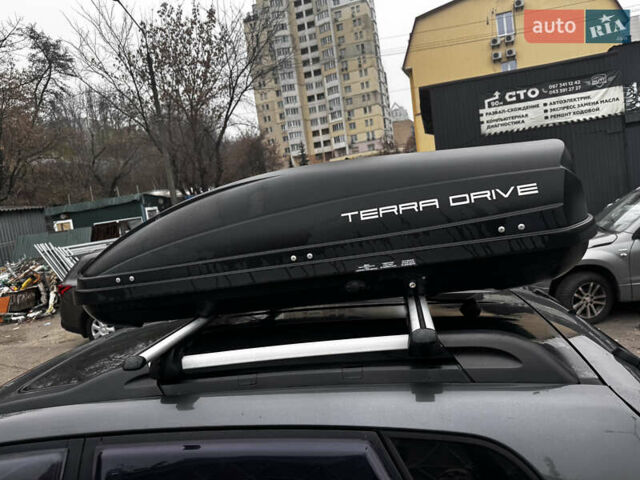 Серый Хендай Туксон, объемом двигателя 2.66 л и пробегом 247 тыс. км за 7250 $, фото 4 на Automoto.ua