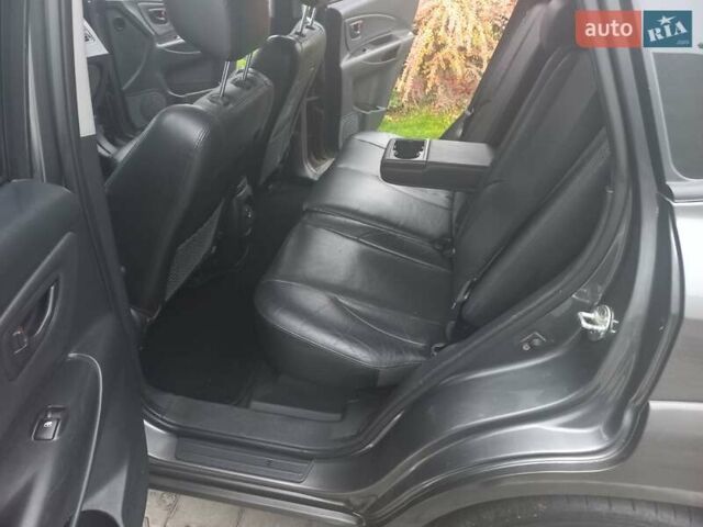 Сірий Хендай Туксон, об'ємом двигуна 2 л та пробігом 190 тис. км за 8600 $, фото 48 на Automoto.ua