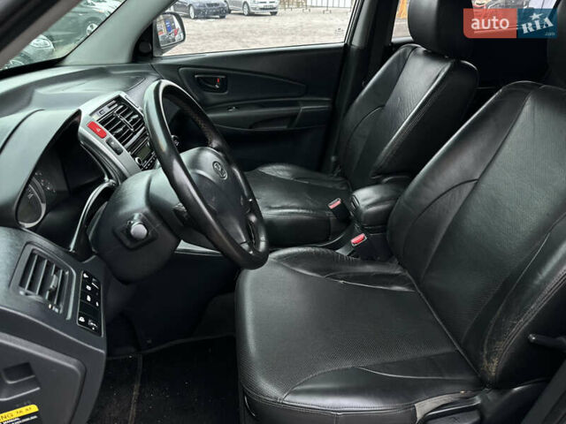 Серый Хендай Туксон, объемом двигателя 2 л и пробегом 232 тыс. км за 7200 $, фото 12 на Automoto.ua