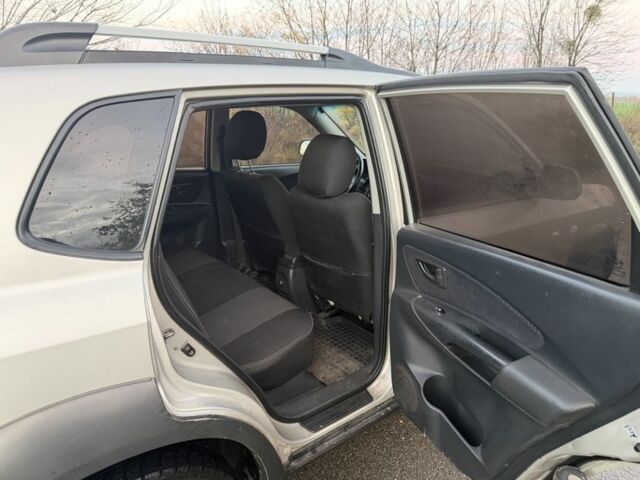 Хендай Туксон 2007 у Ахтырке на Automoto.ua Сірий Хендай Туксон, об'ємом двигуна 2 л та пробігом 192 тис. км за 6950 $, фото 10 на Automoto.ua