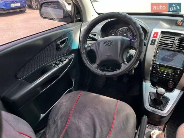 Серый Хендай Туксон, объемом двигателя 2 л и пробегом 255 тыс. км за 7490 $, фото 21 на Automoto.ua