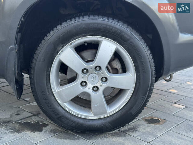 Серый Хендай Туксон, объемом двигателя 1.99 л и пробегом 315 тыс. км за 7300 $, фото 26 на Automoto.ua