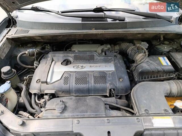 Сірий Хендай Туксон, об'ємом двигуна 1.98 л та пробігом 325 тис. км за 7800 $, фото 7 на Automoto.ua