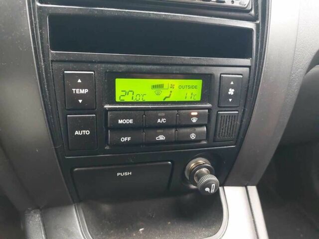 Серый Хендай Туксон, объемом двигателя 2 л и пробегом 245 тыс. км за 4112 $, фото 13 на Automoto.ua