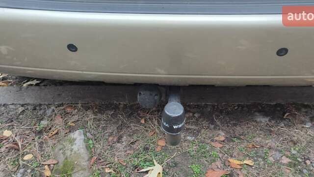 Серый Хендай Туксон, объемом двигателя 1.98 л и пробегом 169 тыс. км за 7500 $, фото 7 на Automoto.ua