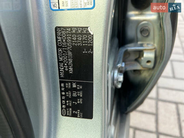 Серый Хендай Туксон, объемом двигателя 1.98 л и пробегом 269 тыс. км за 7500 $, фото 24 на Automoto.ua