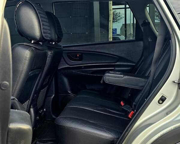 Сірий Хендай Туксон, об'ємом двигуна 2 л та пробігом 198 тис. км за 8250 $, фото 9 на Automoto.ua