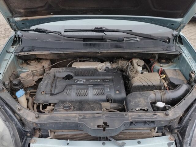 Серый Хендай Туксон, объемом двигателя 2 л и пробегом 2 тыс. км за 6800 $, фото 11 на Automoto.ua