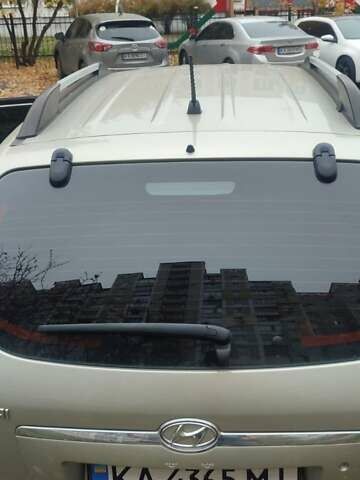 Серый Хендай Туксон, объемом двигателя 1.98 л и пробегом 169 тыс. км за 7500 $, фото 4 на Automoto.ua