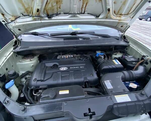 Серый Хендай Туксон, объемом двигателя 2 л и пробегом 213 тыс. км за 7999 $, фото 11 на Automoto.ua