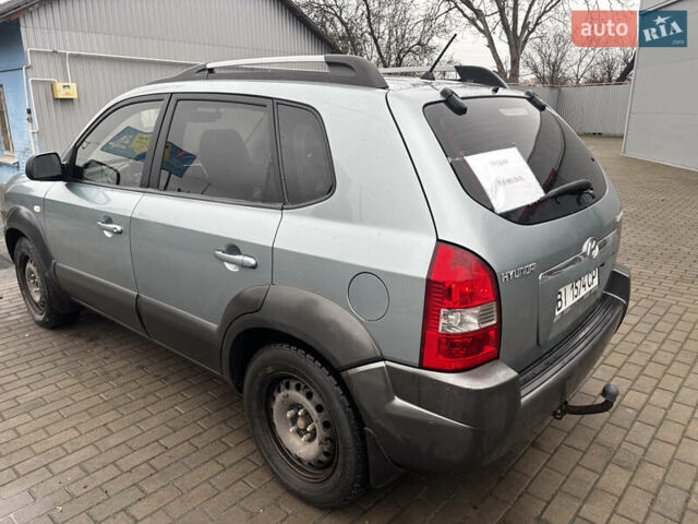Сірий Хендай Туксон, об'ємом двигуна 2 л та пробігом 255 тис. км за 7600 $, фото 6 на Automoto.ua