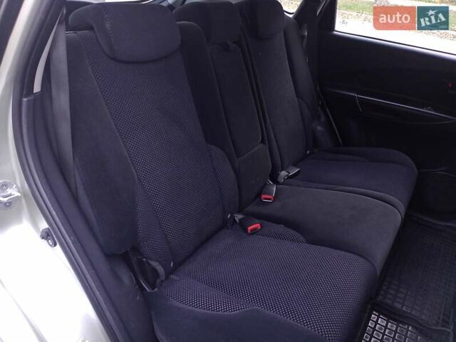 Сірий Хендай Туксон, об'ємом двигуна 1.98 л та пробігом 225 тис. км за 6999 $, фото 39 на Automoto.ua