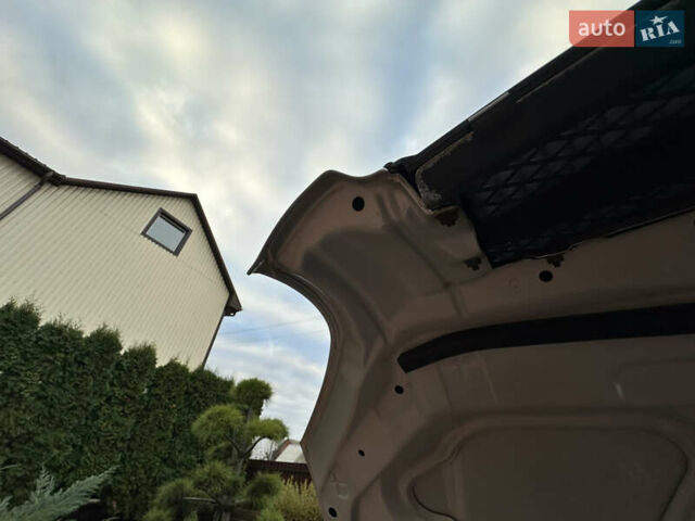 Серый Хендай Туксон, объемом двигателя 1.98 л и пробегом 217 тыс. км за 8500 $, фото 52 на Automoto.ua